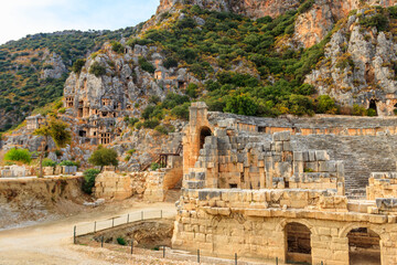 Ruins of ancient Greek-Roman theatre and rock-cut tombs of Lycian necropolis of the ancient city of Myra in Demre, Antalya province in Turkey