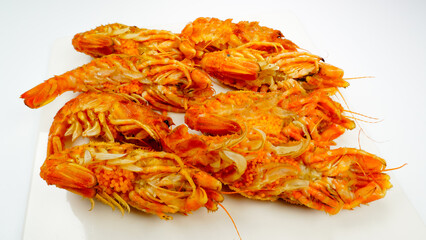 Bear Shrimps (Sclerocrangon salebrosa, Wild Russian Shrimp) on a white plate