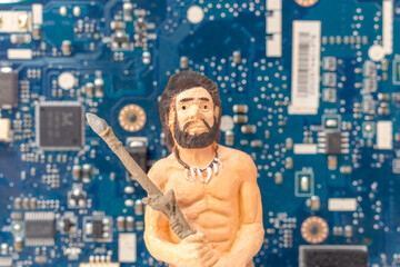 An ancient man standing in front of a computer motherboard , Technology concept