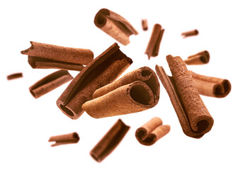 Cinnamon sticks levitate on a white background