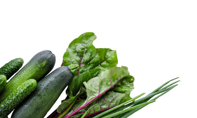 Frame of Green vegetables  cucumber, zucchini, leaves at white background isolated. Copyspace