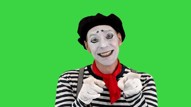 Mime showing his love to camera on a Green Screen, Chroma Key.
