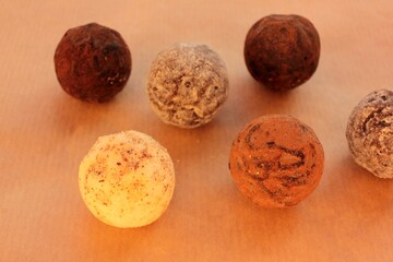 Chocolate truffles on a kraft paper background. View from overhead