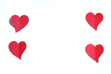 Red hearts on white background. Valentines day concept. Space for text.