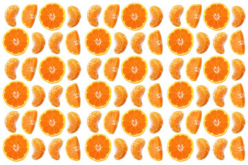 Pattern made with fresh Mandarins or tangerine slices isolated on white background. Flat lay
