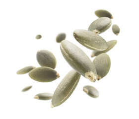 Peeled pumpkin seeds levitate on a white background