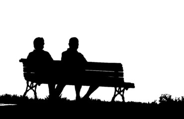 Fototapeta na wymiar Bench with two people watching the landscape