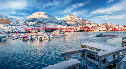 Beautiful winter scenery. Impressive morning view of Lofoten Islands. Wonderful snowy cityscape of Sorvagen town, Norway, Europe. Splendid seascape of Norwegian sea. © Andrew Mayovskyy