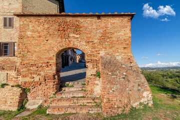The ancient Porta al Rivellino in the historic center of Certaldo alto, Florence, Italy, on a sunny day
