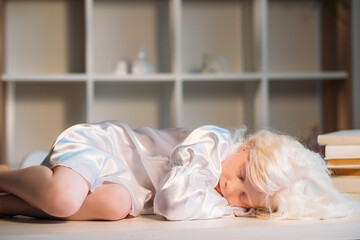 Sleeping kid. Carefree childhood. Dream lullaby. Peaceful tired adorable sweet blonde little girl...
