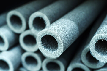 Foamed polyethylene insulation material for sanitary pipes. Trade in building materials in a store....
