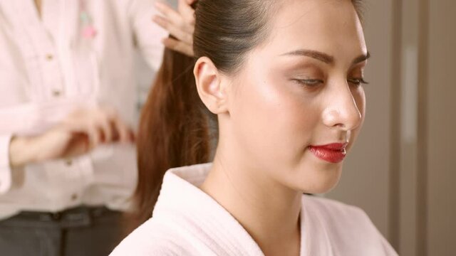 Happy attractive asian woman apply skincare cream on face and body.Female  hand touch face  and smooth applying cream and lotion for rejuvenation, beauty perfect with wellness, skin care .