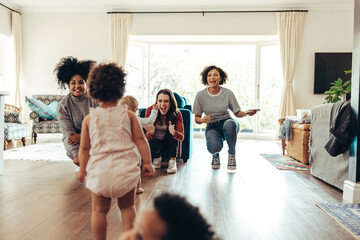 Mothers playing with their children in club