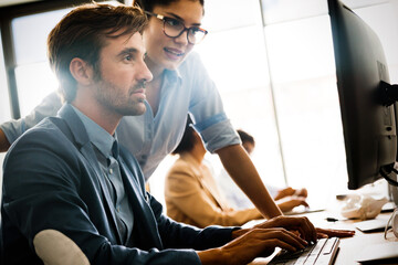 Startup business people group of programmer working as team to find solution to problem