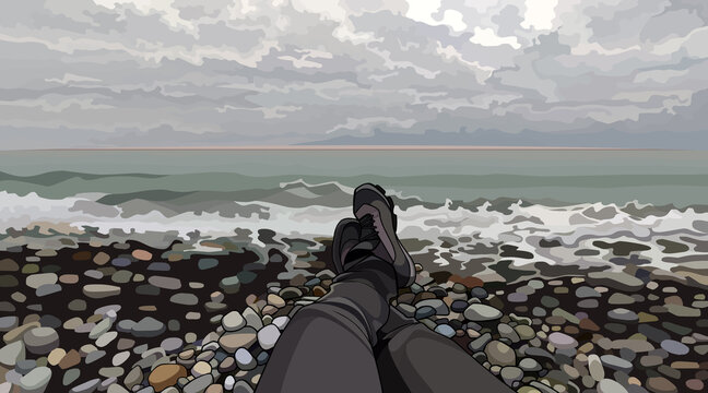 lying on the pebbly seashore in cloudy weather