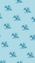 Creative layout made with blue passenger airplane on sky blue background. Minimal travel of holiday vacation concept. Flat lay, top view.