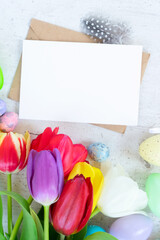 Easter colored eggs with tulips