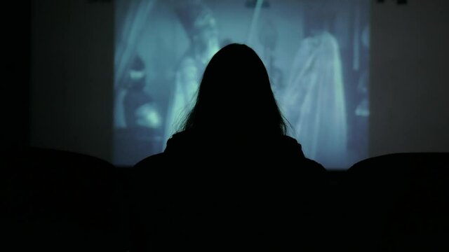 silhouette of a woman in cinema 