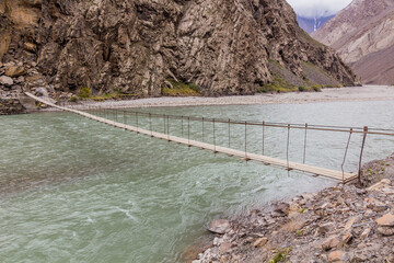 Hanging bridge over Bartang river in Tajikistan