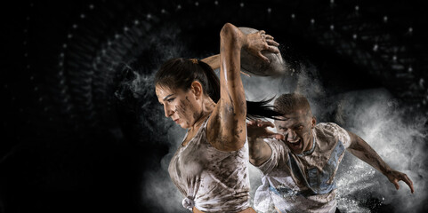 Two rugby players in action