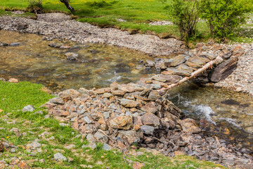 Footbridge in Jizev (Jisev or Jizeu) valley in Pamir mountains, Tajikistan