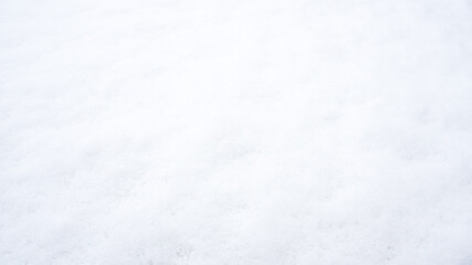 Fresh snow background in sunny winter day. White background with copy space.