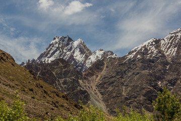 Fototapeta na wymiar Snow covered peaks in Pamir mountains, Tajikistan