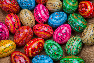 Fototapeta na wymiar Background with painted Easter Eggs. Happy Easter egg.