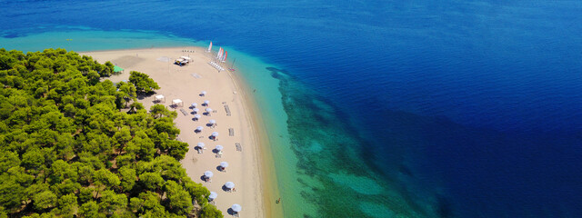 Aerial drone ultra wide photo from paradise organised bay and sandy beach of Gregolimano, North...