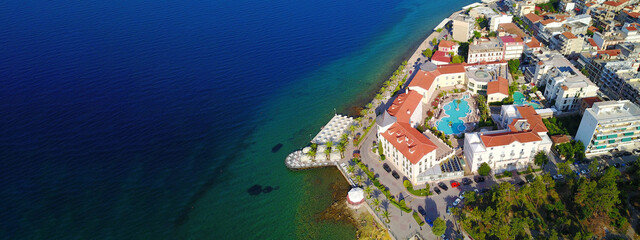 Aerial drone ultra wide photo of famous seaside village well known for thermal springs of Aidipsos,...