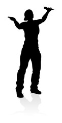 A singer pop, country music, rock star or hiphop rapper artist vocalist singing in silhouette