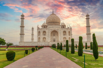 Taj Mahal Agra with moody sunrise sky. A UNESCO World Heritage site at Agra India	