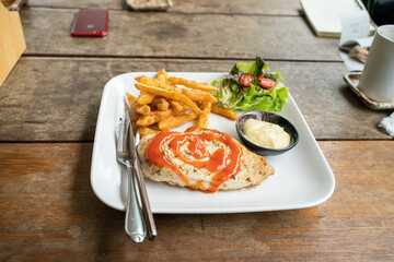 Grilled ckicken breast steak with potato and vegetable