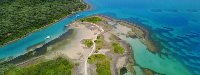 Aerial drone ultra wide panoramic photo of exotic paradise island complex forming an atoll archipelago 