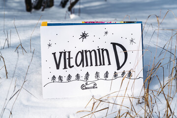 Vitamin D help in treating coronavirus. Vitamin D, coronavirus and question mark on snow background.