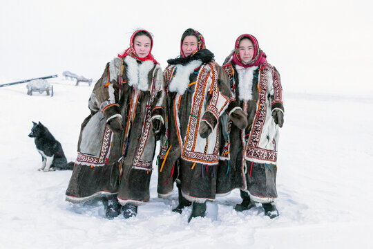 Yamalo-Nenets Autonomous Okrug, extreme north, Nenets family in the national winter clothes of the northern inhabitants of the tundra, the Arctic circle