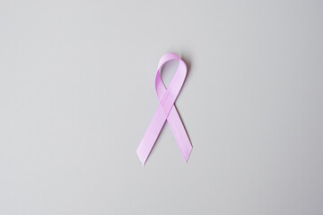 World cancer day (February 4). Lavender purple ribbon for supporting people living and illness....