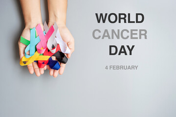 World cancer day (February 4). colorful awareness ribbons; blue, red, green, black, grey, white,...