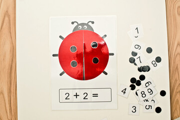 ladybug table game. logical excersice. dots and numbers. create your own mathematical equation. implement for primary school and children with disabilities.
