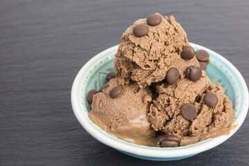 dark chocolate ice cream scoops with chocolate drops