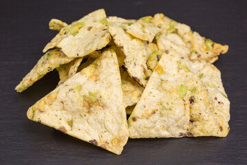 healthy snack of crisps with chickpea, green and yellow peas, black beans and herbs - 402835605