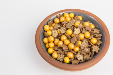 background of sugar sprinkles in orange and brown with stars and balls