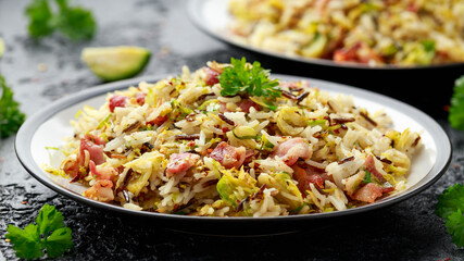 Fried Brussels sprouts with rice and crispy bacon