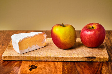 Still life with apples and cheese