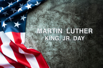 Fototapeta na wymiar Martin Luther King Day Anniversary - American flag on abstract background