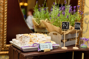 Handmade marshmallows on a rustic sweet table at the wedding party