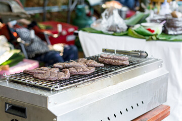 Thai northern sesame rice on the grill sell at local market.