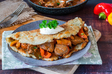 Hungarian goulash with potato pancake