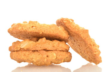 Several torchetti cookies with oatmeal, close-up, isolated on white.