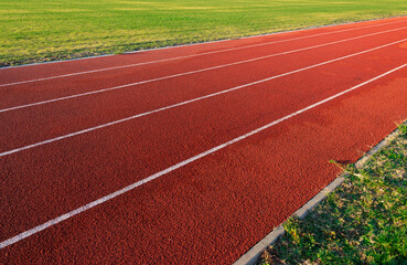 Athletic tartan covered running track.